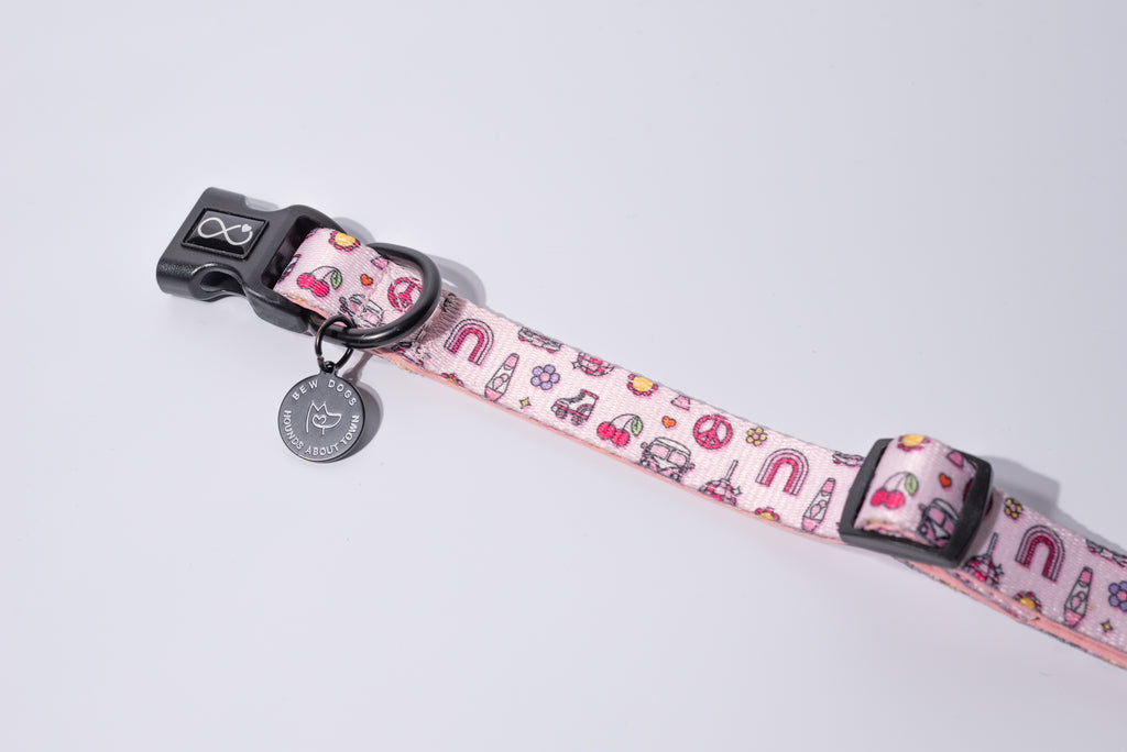 a super fun, pink, disco design dog collar in 3 sizes and fully adjustable, sits on a white backgroun