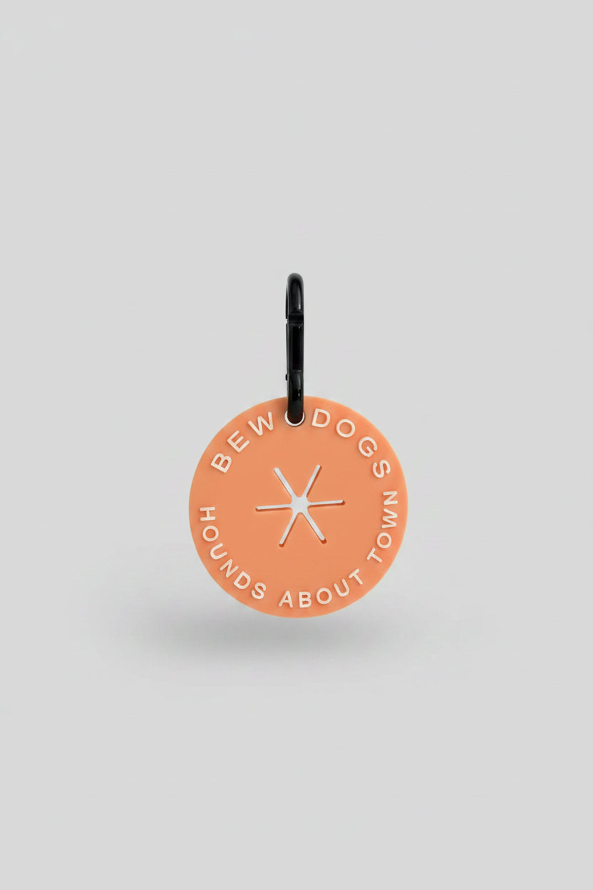 a peach coloured dog walking essential, poop loop from bew dogs, studio shot against a white background. The best accessory for clean and tidy dog walks. 