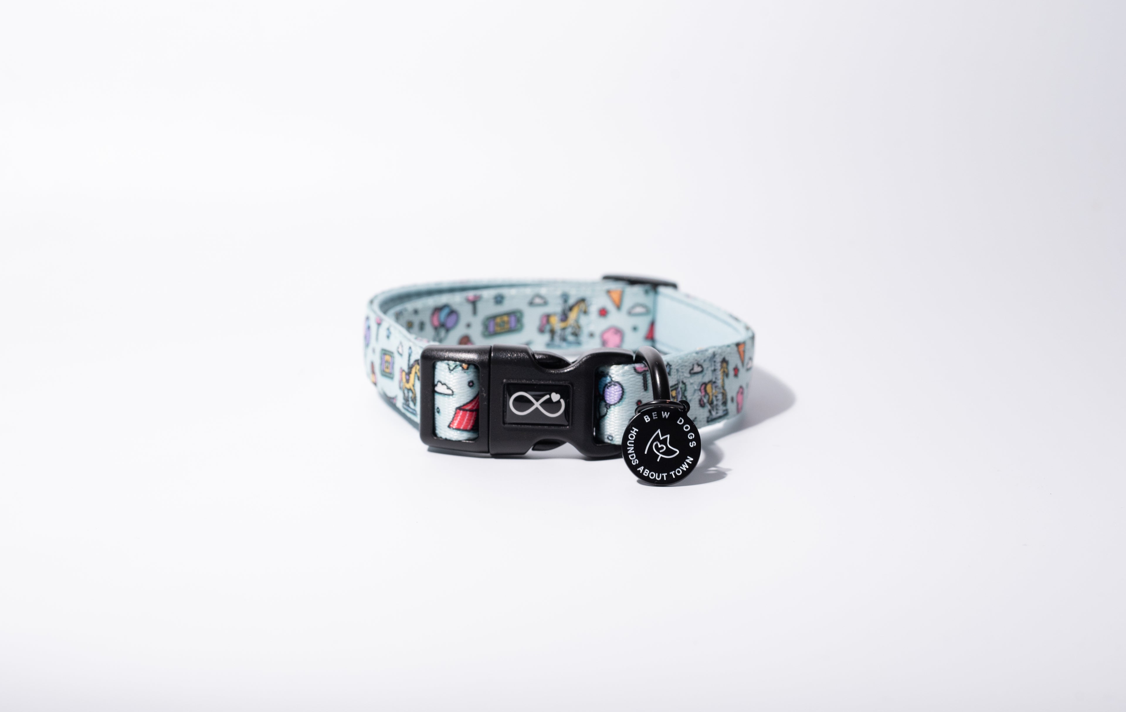 Comfortable and adjustable dog collar with fun design in baby blue, on a white background