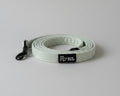 a soft everyday mint green fabric lead from bew dogs, shown against a grey background, available as part of a matching walking set. 