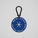 navy blue poop loop, essential dog walking accessory from bew dogs, shown against a white wall