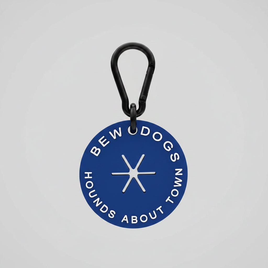 navy blue poop loop, essential dog walking accessory from bew dogs, shown against a white wall